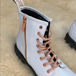 white and rose gold doc martens